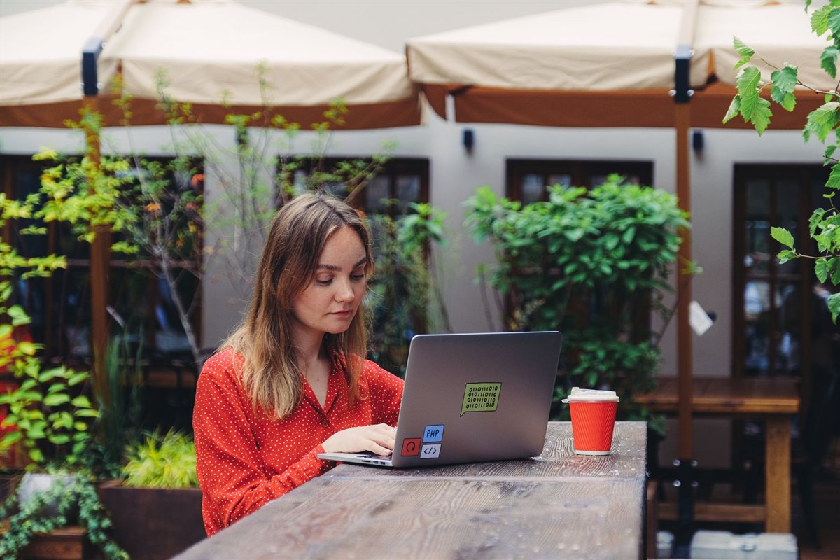 Freelance web designer working on a laptop