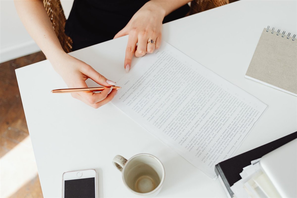 Business owner reviewing written content for a website project