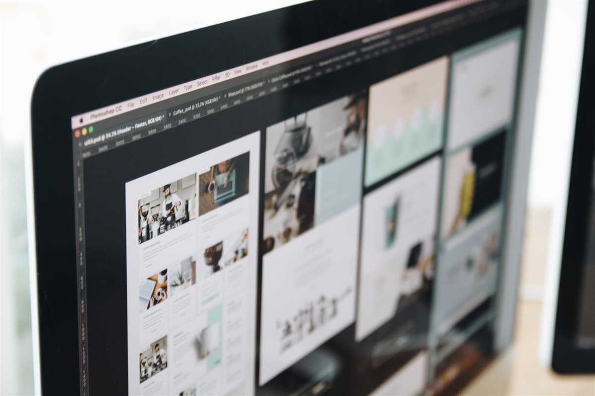 Drag and drop website builder interface on a screen